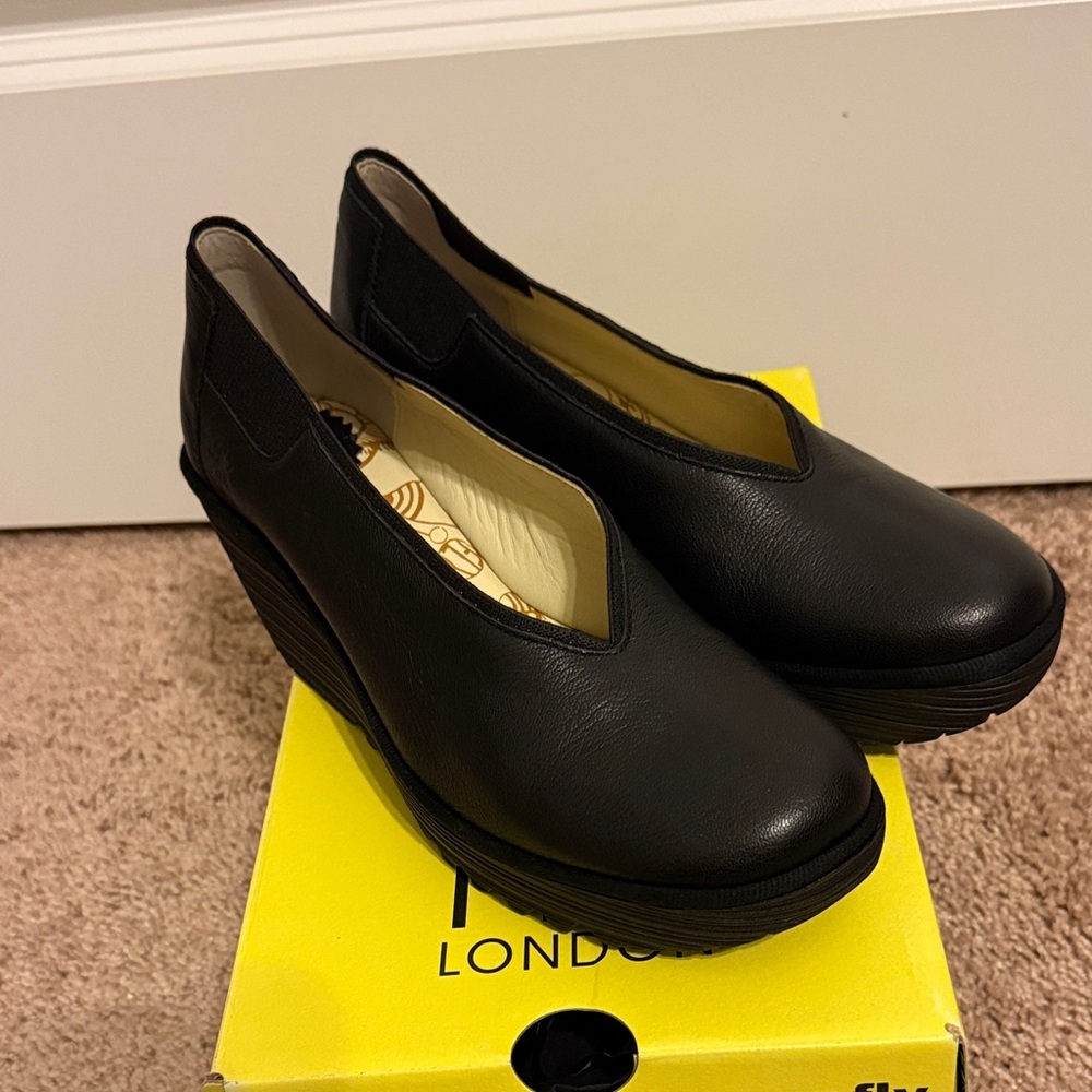 Fly London Women's Elegant Black Wedges